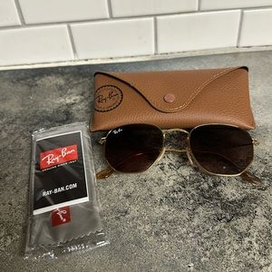 Ray-Ban authentic hexagonal sunglasses.